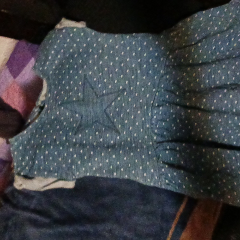 Blue dress polka dot with star in the middle